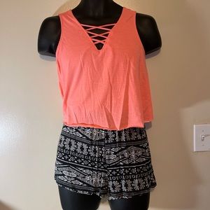 Coral and Black Romper Coral romper with black Aztec design shorts- XS